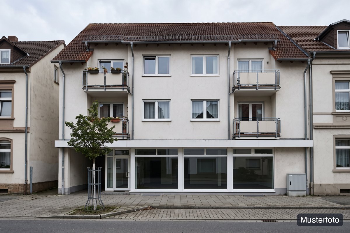 Musterfoto Wohn-/Geschäftshaus, nicht das tatsächliche Objekt