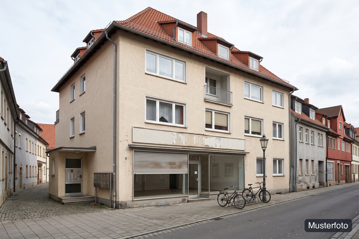 Musterfoto Wohn-/Geschäftshaus, nicht das tatsächliche Objekt